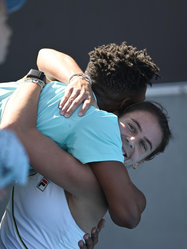 HOBART, AUSTRALIA - JANUARY 13: Emma Navarro of USA hugs coaches after winning the 2024 Hobart International at Domain Tennis Centre on January 13, 2024 in Hobart, Australia. (Photo by Steve Bell/Getty Images)