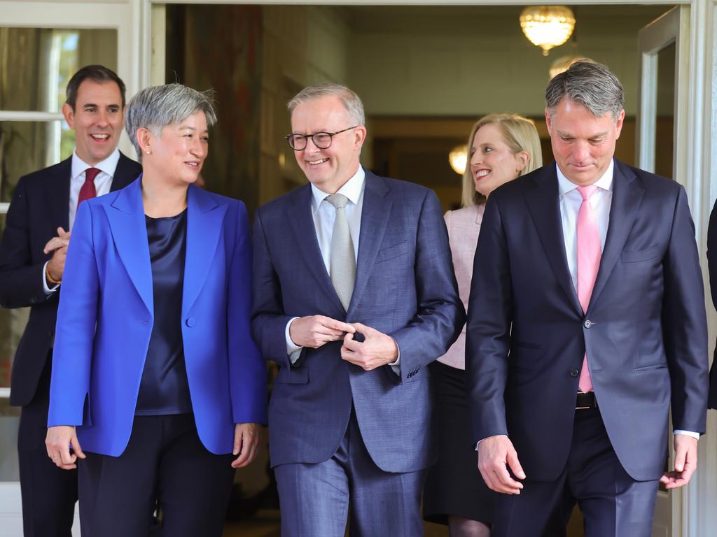 Anthony Albanese (C), Penny Wong (L) and Richard Marles (R) walk out of Government House after being sworn in as Prime Minister, Foreign Minister and Deputy Prime Minister respectively. Picture: Getty Images