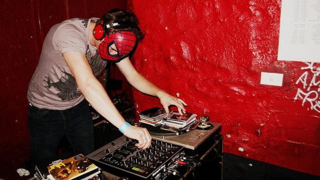 News Corp journalist Mikey Cahill (DJ Joey Lightbulb) DJing at Pony Bar, prepping for wedding gigs.