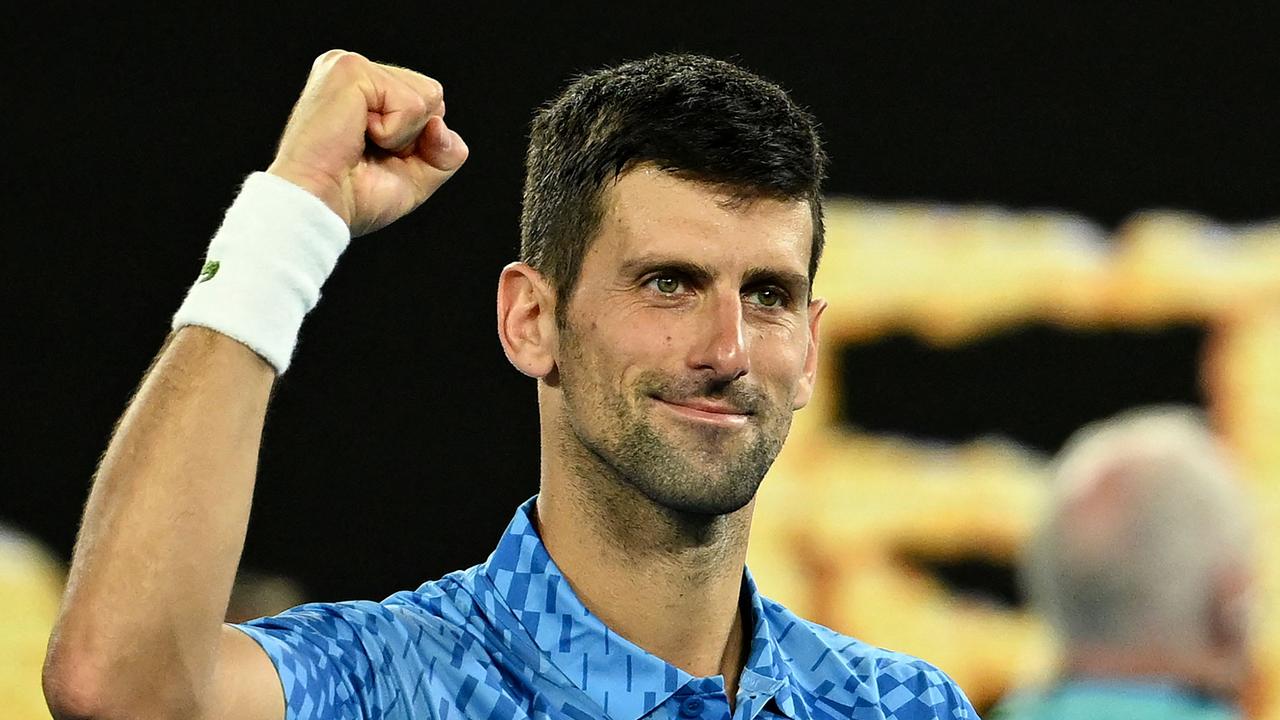 Serbia's Novak Djokovic celebrates victory against Australia's Alex De Minaur. Photo by MANAN VATSYAYANA / AFP.