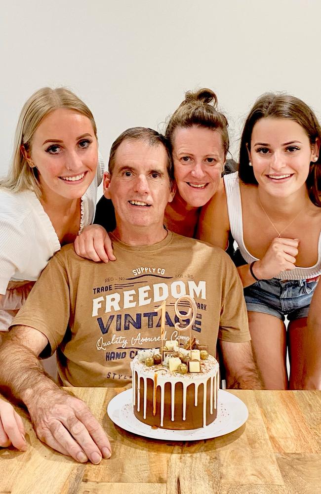 Kaylee McKeown (far right) celebrating her 19th birthday with her sister Taylor, mum Sharon and father Sholto before he passed away in 2020.