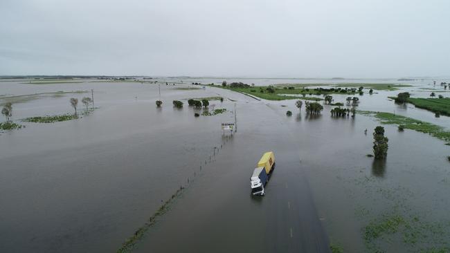 Drone images of flooding at Thompson's Creek on the Bruce Highway at Goorganga Plains looking north on January 15 2023. Photos: Robert Murolo