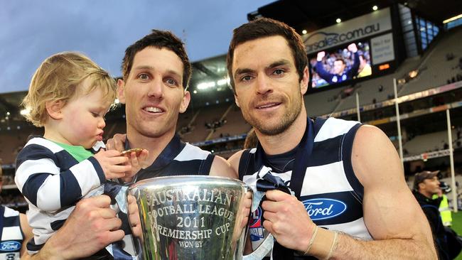 Harry Taylor and Matthew Scarlett with the 2011 premiership cup.