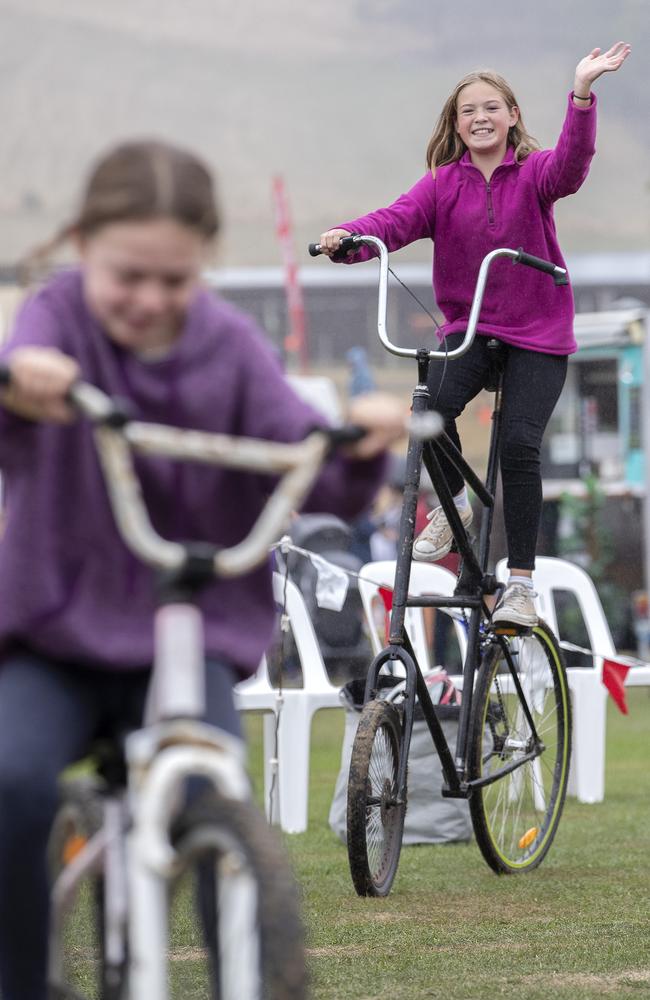 Tilly Whitfield 12 rides a Crazy Bike at A Taste of the Huon. Picture: Chris Kidd