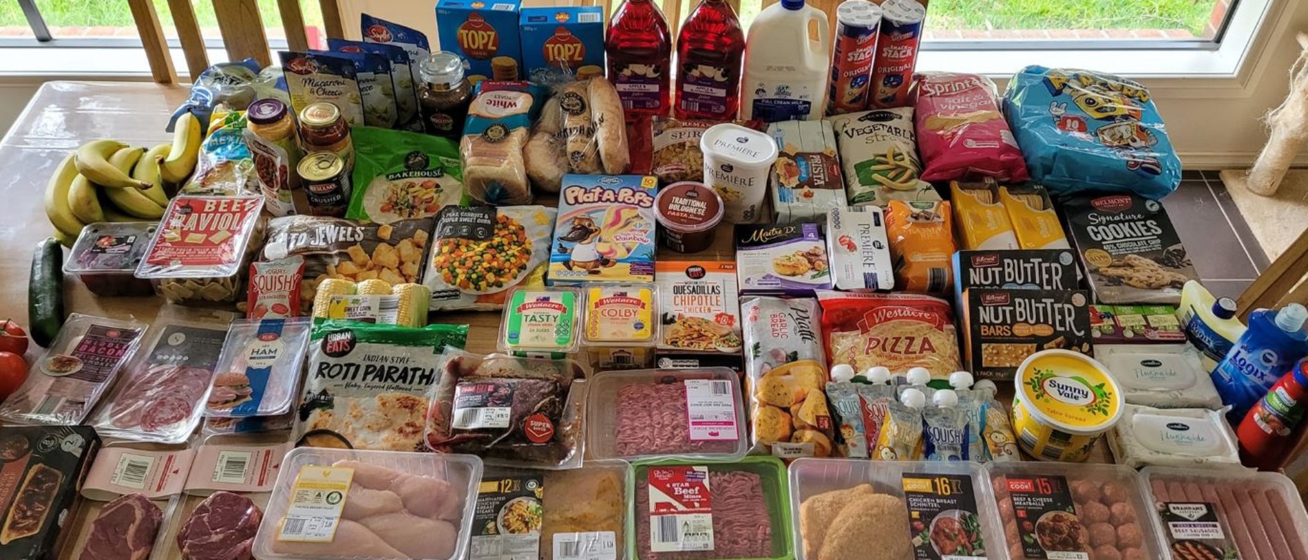 The woman shared a picture of her Aldi shop on Facebook, asking people to guess how much she had spent. Picture: Facebook/Aldi Mums.
