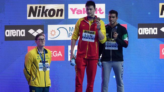 Australia's Mack Horton (left) refuses to stand on the podium with China's Sun Yang after he won the World Championships 400m freestyle gold medal in South Korea. Picture: AFP