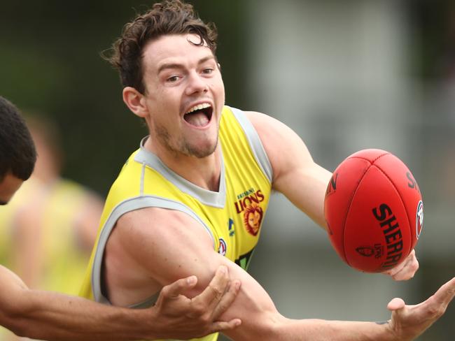 BRISBANE, AUSTRALIA - FEBRUARY 26: Lachie Neale handballs during a Brisbane Lions joint AFLW & AFL Media Opportunity at Giffin Park on February 26, 2019 in Brisbane, Australia. (Photo by Chris Hyde/Getty Images)