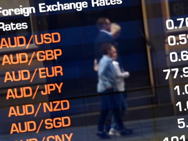 The Australian dollar exchange rates are displayed on the Australian Stock Exchange (ASX) trading board in Sydney, Thursday, Sept. 29, 2016. (AAP Image/Mick Tsikas) NO ARCHIVING