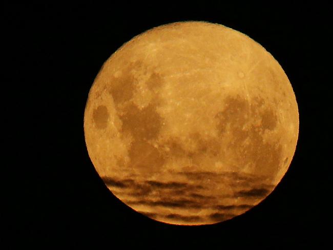 MELBOURNE, AUSTRALIA - MARCH 02:  A full moon is seen during the round five AFLW match between the Melbourne Demons and the Brisbane Lions at Casey Fields on March 2, 2018 in Melbourne, Australia.  (Photo by Michael Dodge/Getty Images)