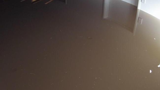 CCTV picture of flooding at Shane McNamara's property at Carina in the aftermath of Cyclone Alfred