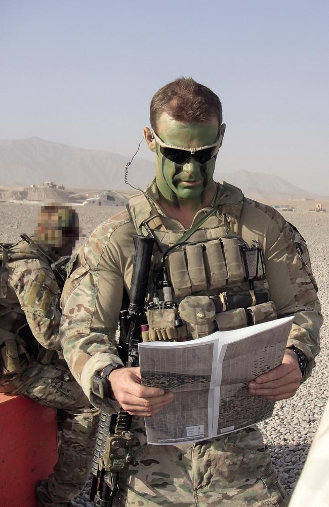 Cameron Baird consults a map during Bravo Company’s final Afghan Rotation.