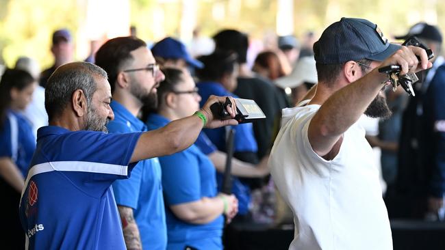 Soccer fans are scanned by security staff. Picture: Getty Images