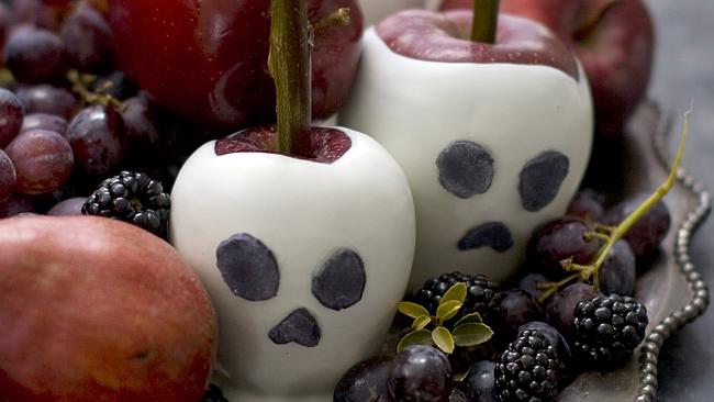 Candied apple craniums made from red apples dipped in white candy. Picture: AP Photo/Matthew Mead