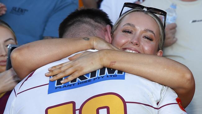 Thirlmere’s Kye Madden embraces his girlfriend Chloe McDonald. Picture: John Appleyard