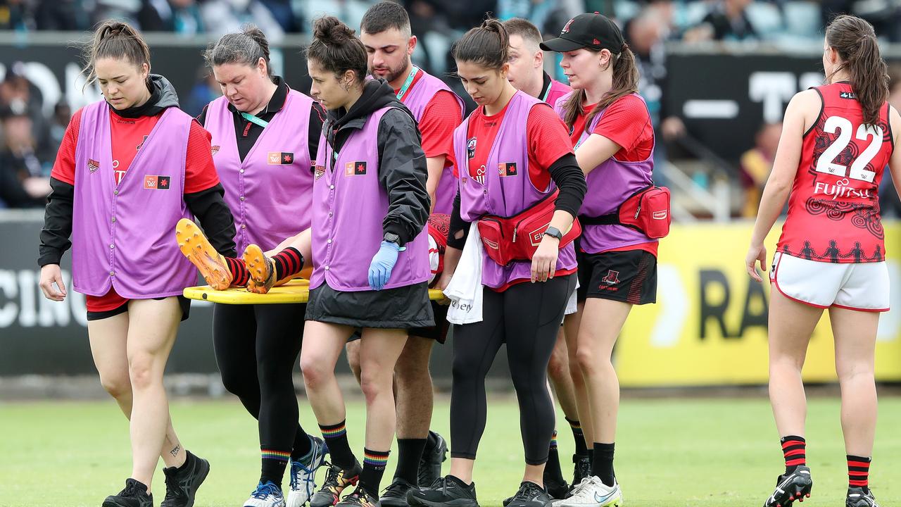 Essendon’s Lily-Rose Williamson was stretchered off against Port Adelaide. Picture: Sarah Reed