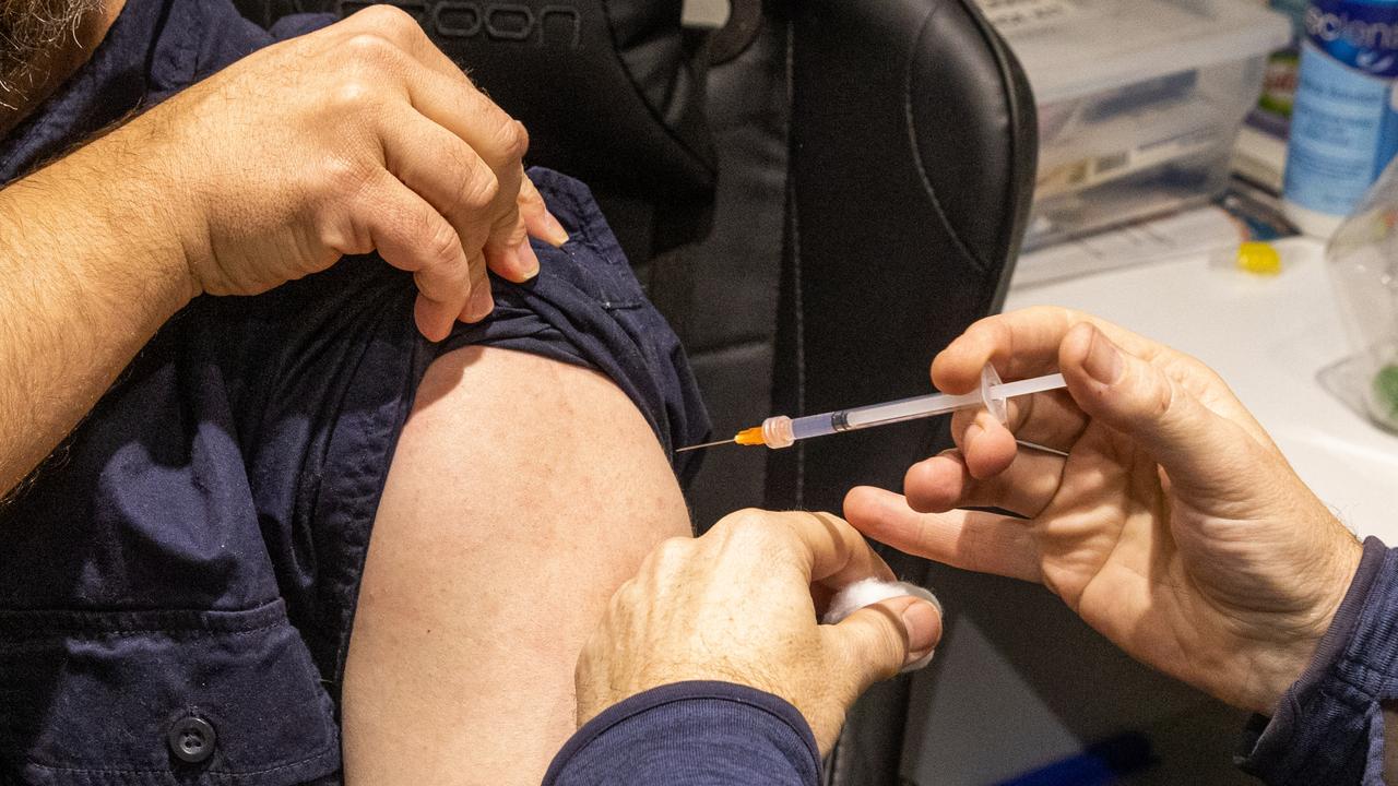 A pharmacist administers Covid vaccine booster. Picture: Asanka Ratnayake/Getty