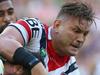 SYDNEY, AUSTRALIA - MARCH 15: Adam Reynolds of the Rabbitohs is tackled by Jared Waerea-Hargreaves of the Roosters during the round two NRL match between South Sydney Rabbitohs and the Sydney Roosters at ANZ Stadium on March 15, 2015 in Sydney, Australia. (Photo by Mark Kolbe/Getty Images)