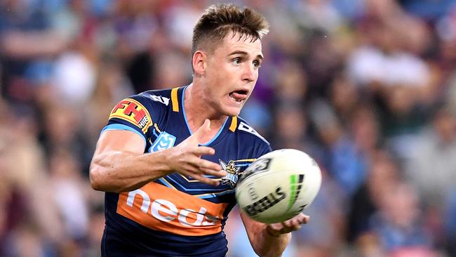 BRISBANE, AUSTRALIA - MAY 09: AJ Brimson of the Titans passes the ball during the round nine NRL match between the Gold Coast Titans and the Cronulla Sharks at Suncorp Stadium on May 09, 2019 in Brisbane, Australia. (Photo by Bradley Kanaris/Getty Images)