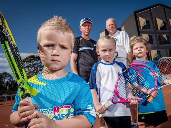 The Frankston Tennis club is to be demolished to make room for the Frankton Hospital expansion. Coach Steve Foot and John McGillivray are joined by juniors Chase Hudson, 3, Mackenzie Hudson, 5 and Roxy O'Brien, 4. Picture: Jake Nowakowski