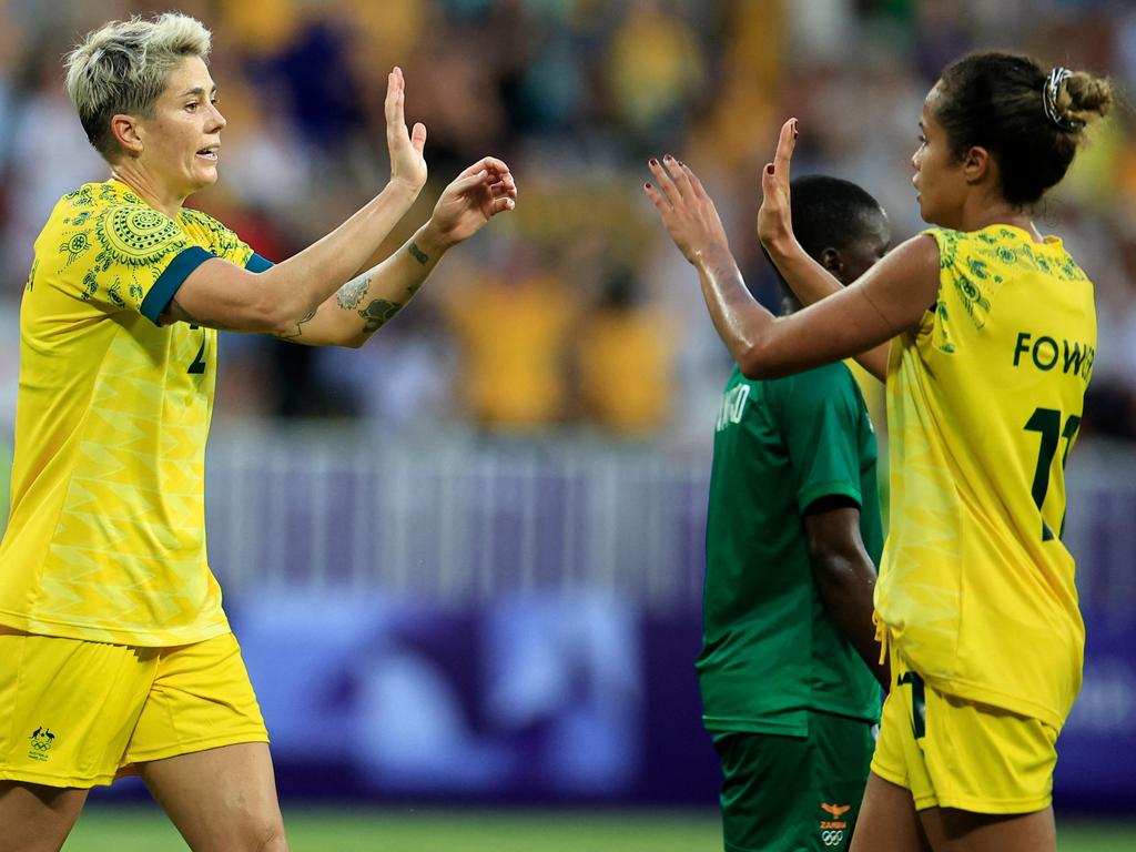 Michelle Heyman celebrates scoring the winner with Matildas teammate Mary Fowler. Picture: AFP