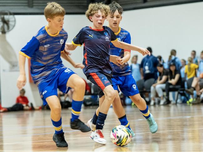 Action from 2025 National Futsal Championships at the State Netball Centre in Melbourne. Picture: Graeme Furlong