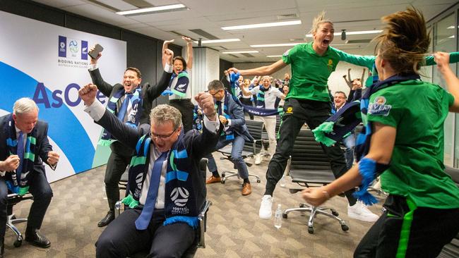 Officials from the As One 2023 campaign celebrate after Australia and New Zealand won the bid to host the FIFA 2023 Women's World Cup. Picture: Twitter/@asone2023