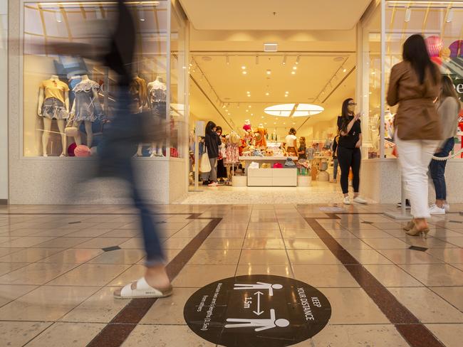 MELBOURNE, AUSTRALIA - OCTOBER 28: Customers are temperature tested before entering Seed at Chadstone Shopping Centre on October 28, 2020 in Melbourne, Australia. Lockdown restrictions in Melbourne lifted as of midnight with people able to leave their home for any reason. Cafes, restaurants, pubs and bars can reopen subject to patron limits while beauty services, tattoo parlours and any other service where you can wear a mask will be able to resume. Up to 10 people from any number of households will be able to gather outdoors, however, Victorians are still required to wear a face mask in public. Metropolitan Melbourne has been subject to Stage 4 restrictions since 2 August 2020 with residents under stay at home orders following a second wave of COVID-19 cases in the community. (Photo by Daniel Pockett/Getty Images)