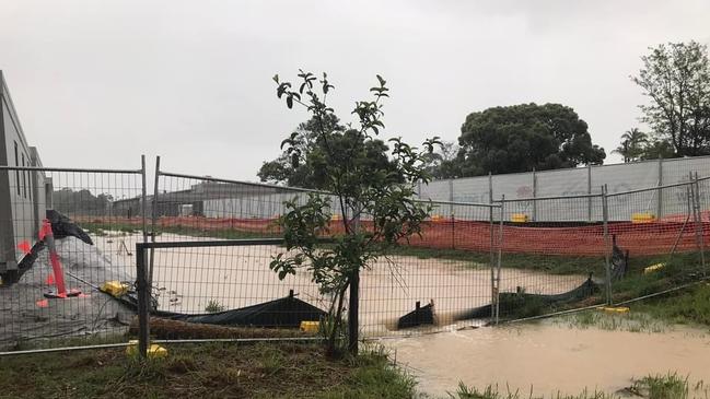 This photo was taken on Sunday by a resident of the flats at 1 Poinciana Street from the back (north side) of the pod site. This is after 100mm. Source: Louise Gordon