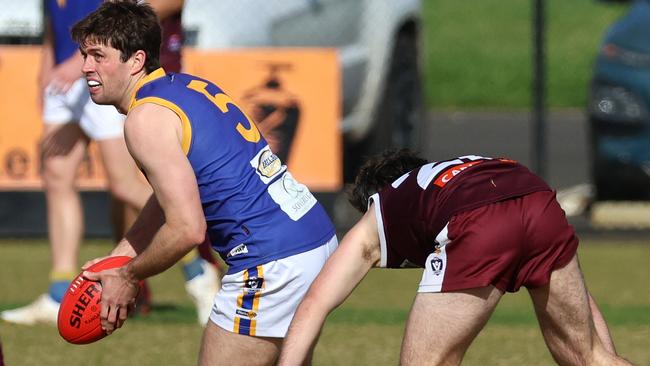 Ballarat: Sebas’ Tony Lockyer escapes his opponent. Picture: Hamish Blair