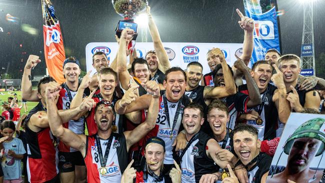 Southern Districts celebrate their 2024-25 NTFL grand final win against St Mary's. PIcture: Pema Tamang Pakhrin