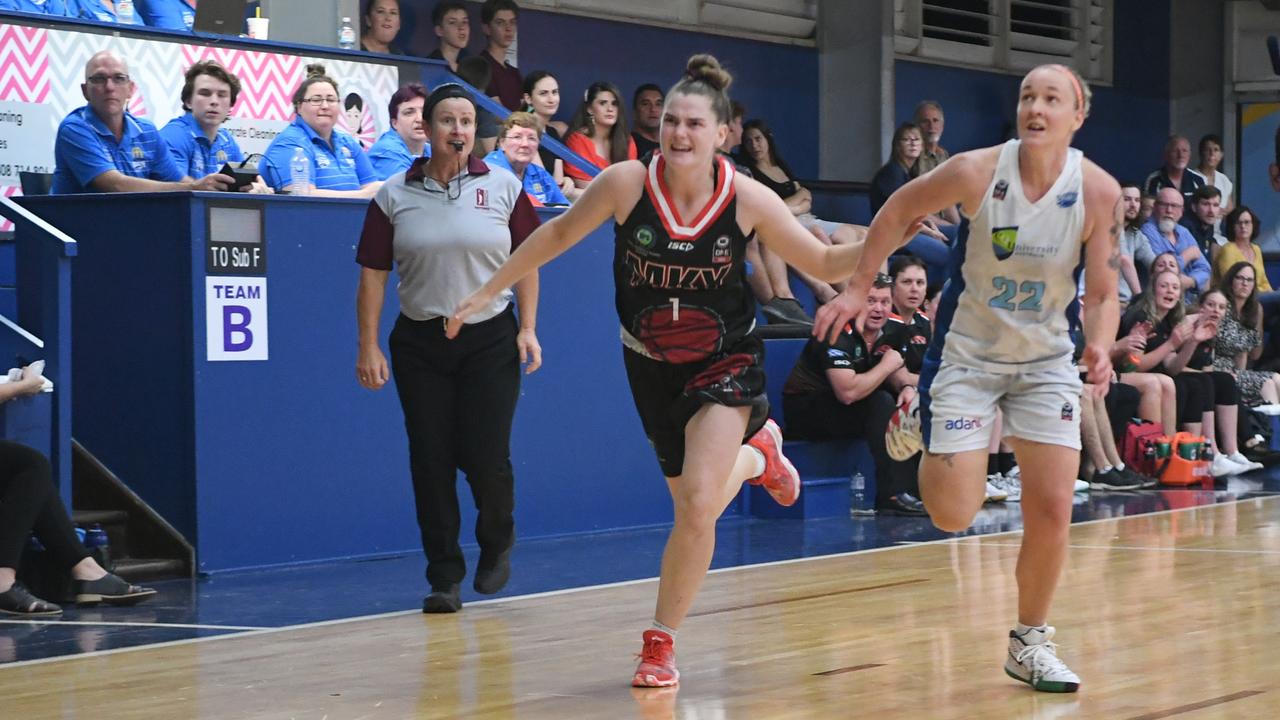BASKETBALL ConocoPhillips CQ Cup Rd 1: Mackay Meteorettes' Phoebe Holmes and Rockhampton Cyclones' Katrina Clifford