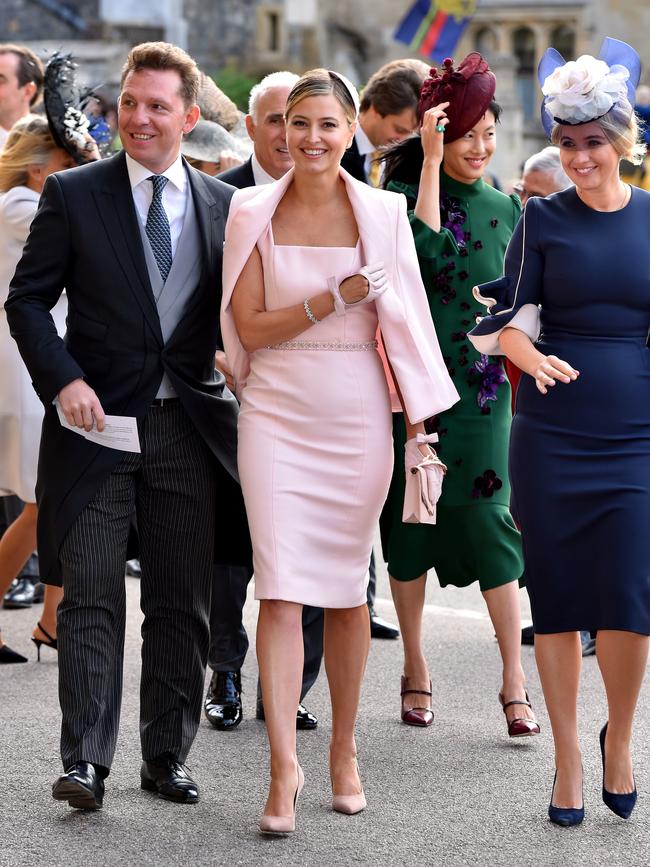 Holly stunned in a pastel pink dress with matching blazer. Picture: Getty