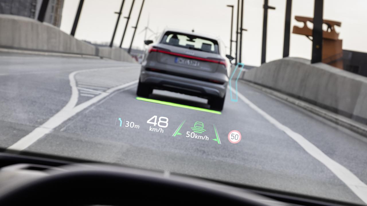 Audi‘s new Q4 e-tron will put visual directions on the road turning you when and where to turn.