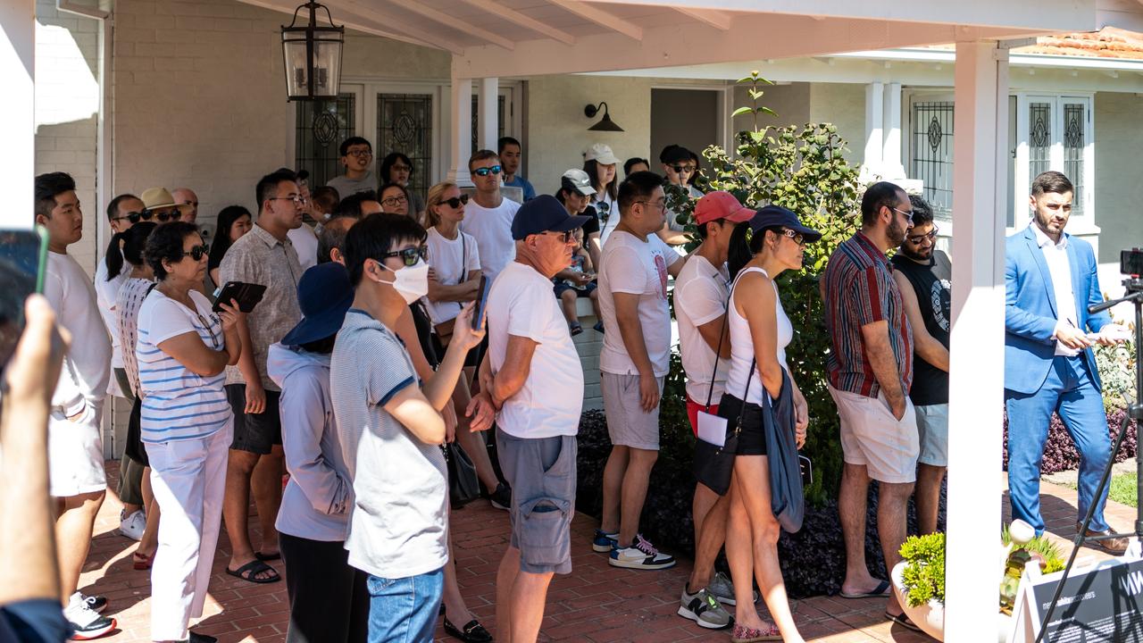 Bidders at the Earlwood auction. Picture: Adrian William