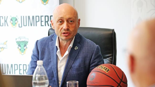 Owner of the NBL Larry Kestelman talks with board members of the Tasmania JackJumpers during their first meeting at their headquarters on Macquarie Street. Picture: Zak Simmonds