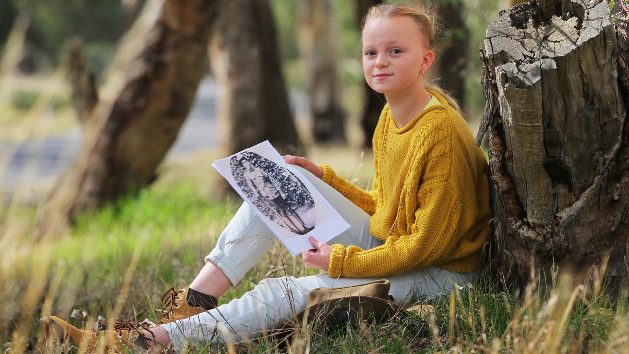 Aliera Tucker, 11, from Jindera, holds a picture of her great grandfather Francis Paxton Martin fought with the Light Horse in World War I. Picture: David Thorpe