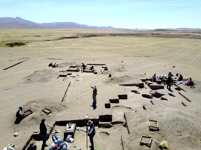 In this undated photo provided BY UC Davis to AFP on November 4, 2020, Archeologists conduct excavations at Wilamaya Patjxa in Peru. - A new study says a woman's place might never have been at home to begin with. Scientists said on November 4, 2020 they had discovered the 9,000 year-old remains of a young woman in the Peruvian Andes alongside a well-stocked big game hunting toolkit. Based on a further analysis of 27 individuals at burial sites with similar tools, a team led by Randall Haas at the University of California, Davis concluded that between 30 to 50 percent of hunters in the Americas during this period may have been women. (Photo by Randall Haas / UC Davis / AFP) / RESTRICTED TO EDITORIAL USE - MANDATORY CREDIT "AFP PHOTO /UC Davis/ Randall Haas " - NO MARKETING - NO ADVERTISING CAMPAIGNS - DISTRIBUTED AS A SERVICE TO CLIENTS