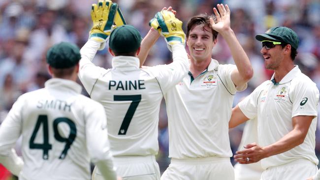 Pat Cummins celebrating a wicket during last year’s Boxing Day Test with Tim Paine, Steve Smith and Mitchell Starc. Picture: Michael Klein