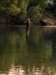 A bloke has been snapped wading into Rapid Creek over the weekend for a fish. Picture: Supplied