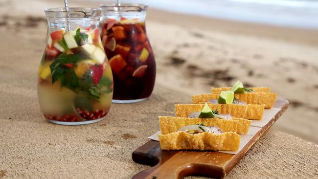 Jugs of sangria and fish tacos at Jah Bar in Dee Why. Picture: Martin Lange