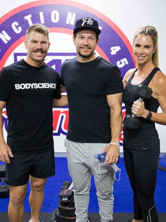 David and Candice Warner with Hollywood star Mark Wahlberg at F45 Woolloomooloo.