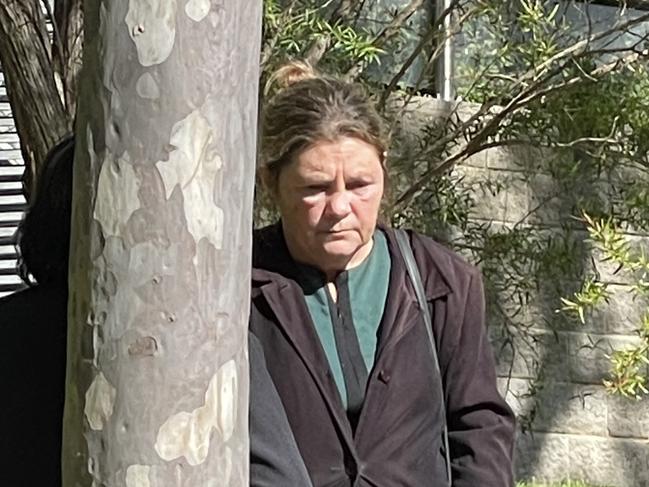 Registered nurse Lisa Robson, 60, of Umina Beach, (green dress) leaving Gosford Local Court where she was convicted of assaulting a patient. Picture: NewsLocal