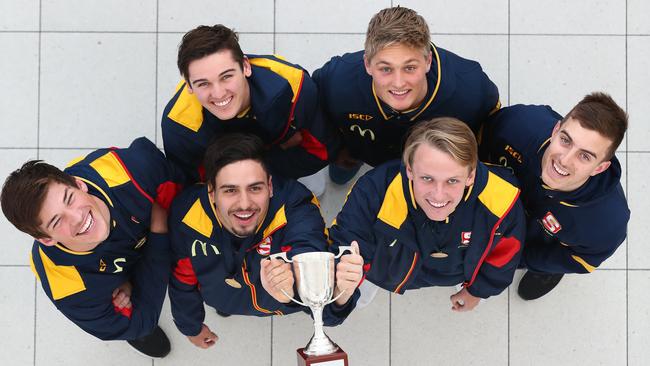 SA’s AFL Academy members, from left, Hugo Munn, Connor Rozee, Izak Rankine, Jackson Hately, Jack Lukosius and Luke Valente, with the AFL under-18 championship trophy. Picture: Tait Schmaal.