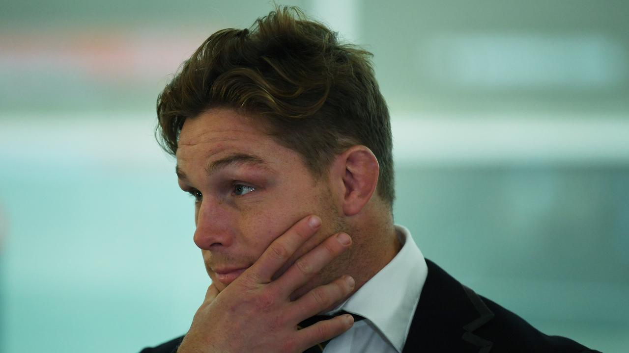 Wallabies captain Michael Hooper arrives at Sydney International Airport in Sydney.