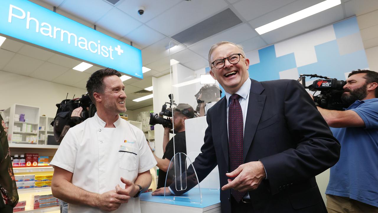 Labor leader Anthony Albanese talking with pharmacist Ross Diebert during a visit to Amcal Parmacy Wadalba, seat of Dobell NSW. Picture: Liam Kidston