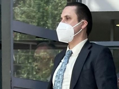 Alexander Meier (with mask) pictured leaving Burwood Local Court.