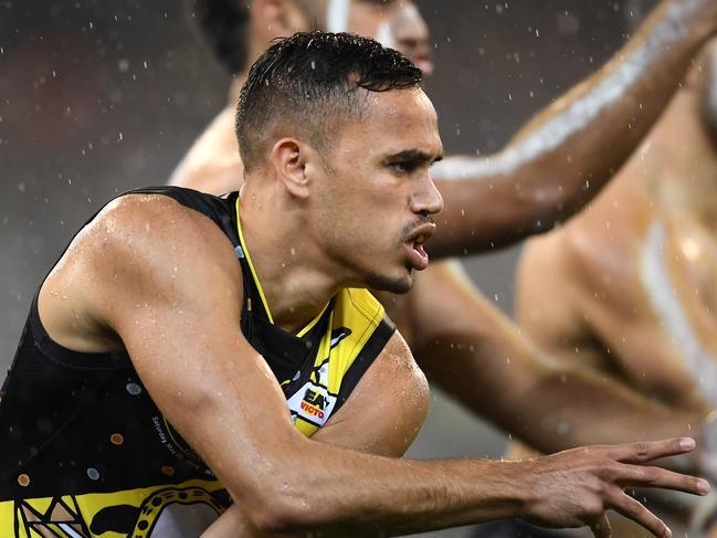 MELBOURNE, AUSTRALIA - MAY 25: Sydney Stack of the Tigers takes part in a tribal dance before the round 10 AFL match between the Richmond Tigers and the Essendon Bombers at Melbourne Cricket Ground on May 25, 2019 in Melbourne, Australia. (Photo by Quinn Rooney/Getty Images)