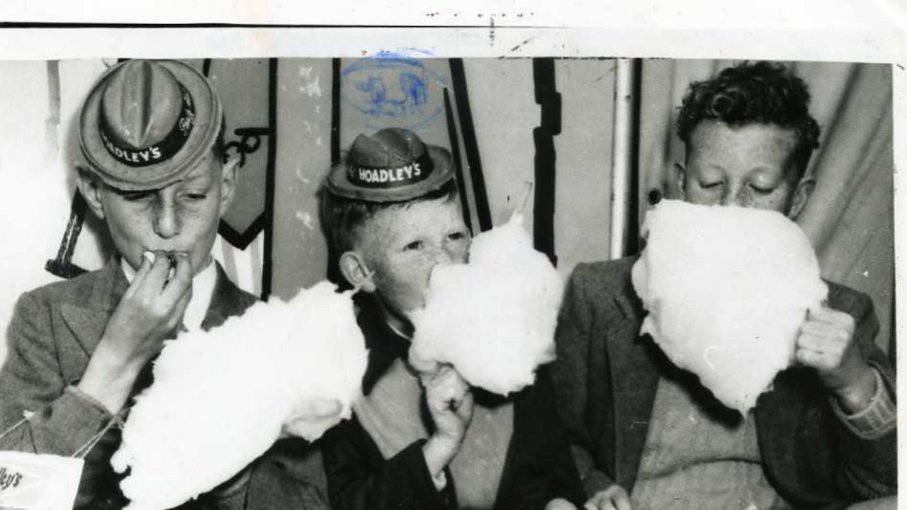 Royal Adelaide Show, circa 1950. Three boys enjoying fairy floss.