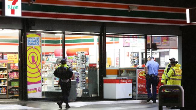 A shot has been fired during an armed robbery at the 7Eleven petrol station on Stacey Street, Bankstown. Two men armed with a shotgun and a pistol entered the business and demanded cash. It is believed a shot was fired. Police established a crime scene. Pics Bill Hearne