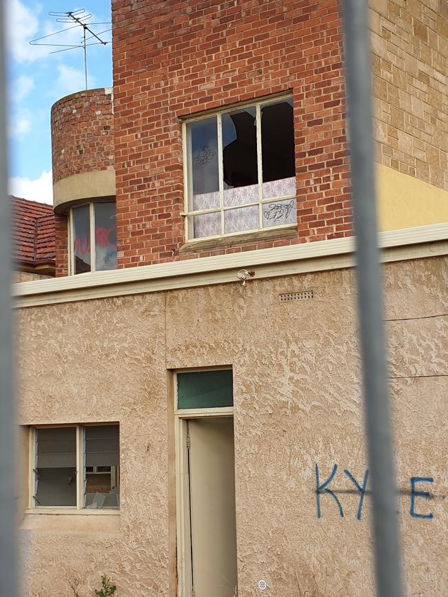 A temporary fence does nothing to prevent people entering the property. Picture: Renato Castello